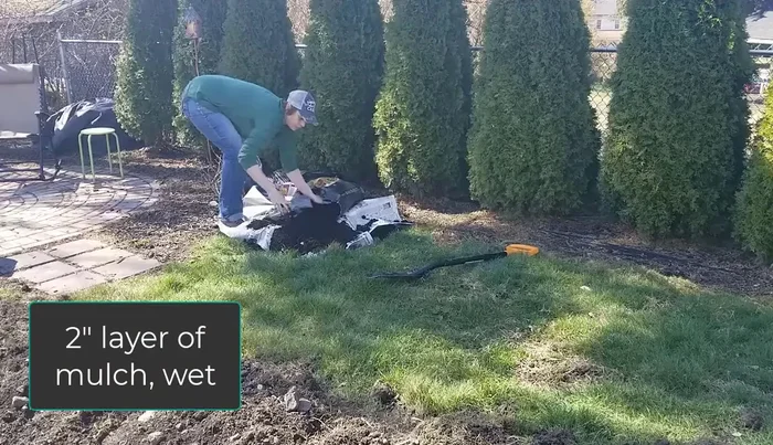 Add a 2-inch layer of mulch on top of the compost.