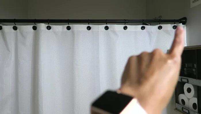 Install black shower rod.