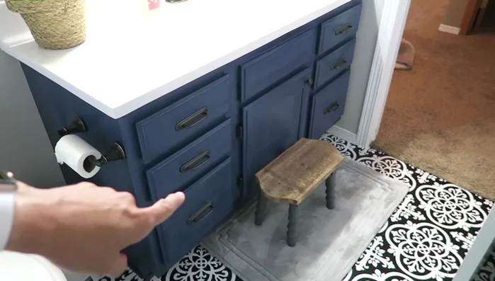 Replace countertop with solid white.