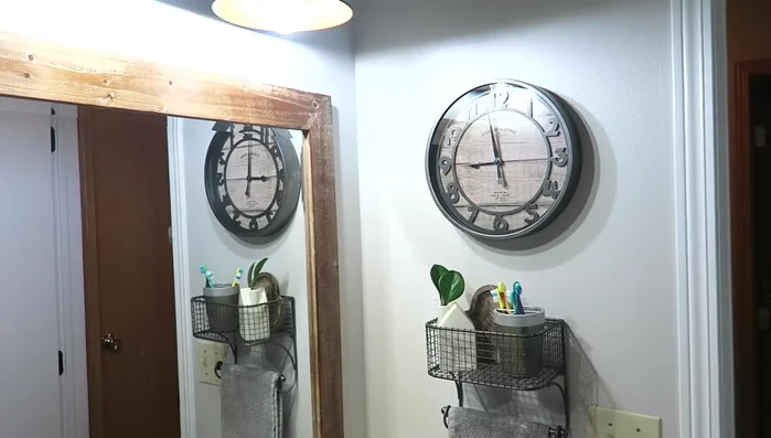 Add decor and accessories (clock, towel shelf, etc.).