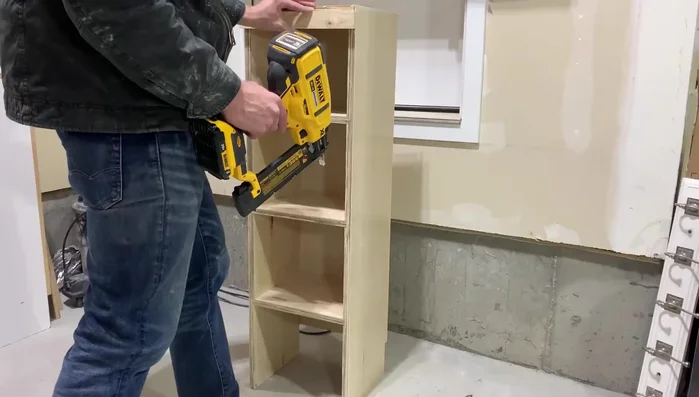 Cut and install face frames using pine and brad nails/glue.