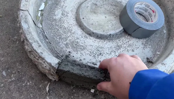 Remove the duct tape and parchment paper.